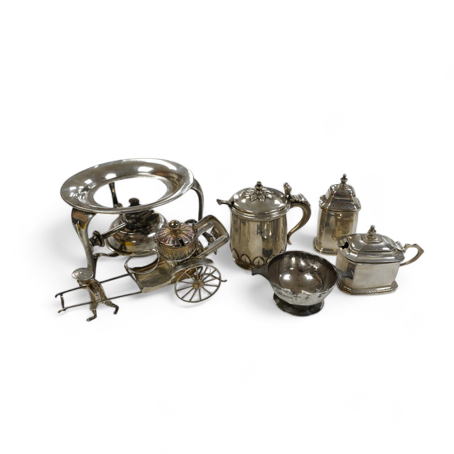 Five assorted silver condiments, including Chinese white metal modelled a rickshaw, together with a plated tea kettle stand with burner. Condition - poor to fair